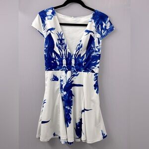 A shaped white and blue floral print dress